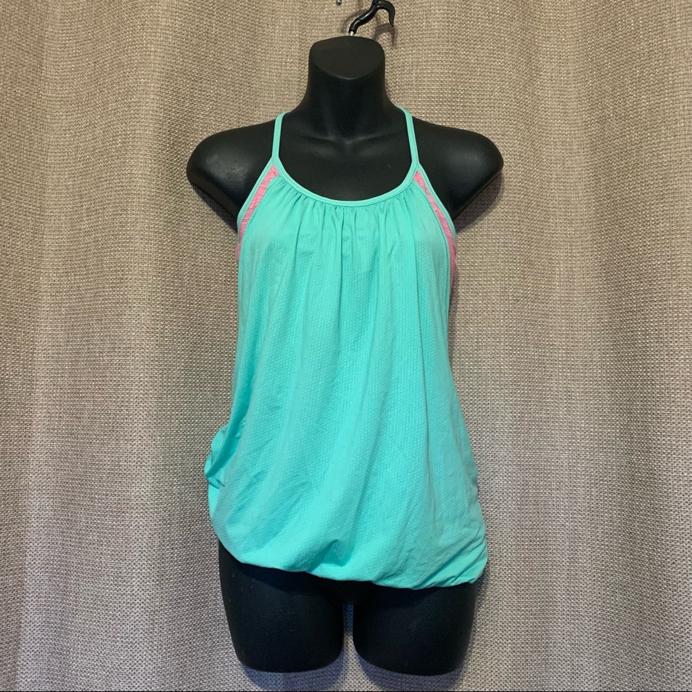 Size 6 Lululemon turquoise and hot pink no limits tank top